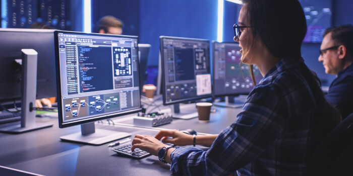 Two People Working at Computers